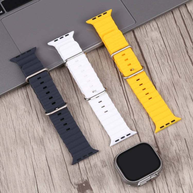 Watch dummy display with yellow, white, and dark blue silicone bands