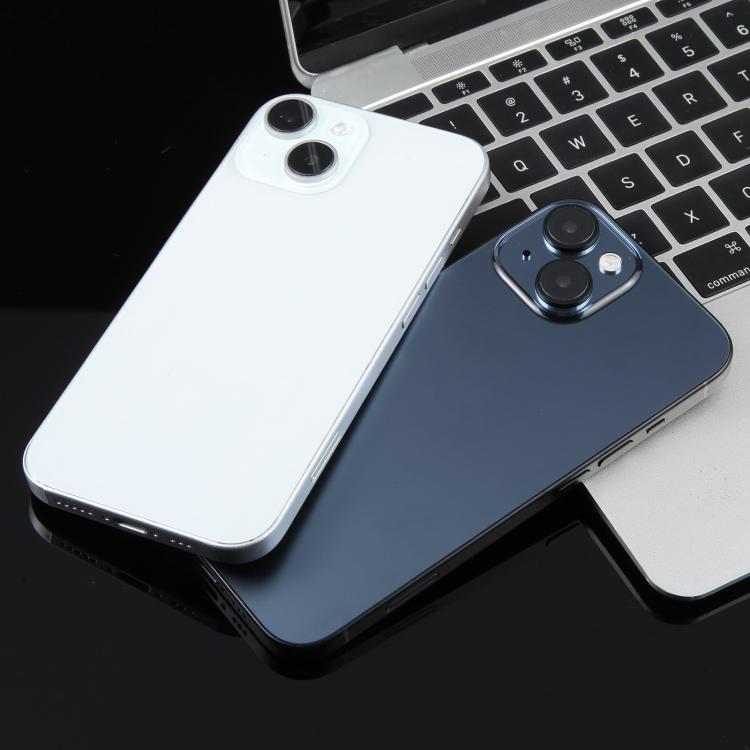 iPhone 15 dummy display model on desk, white and dark blue backs visible with cameras