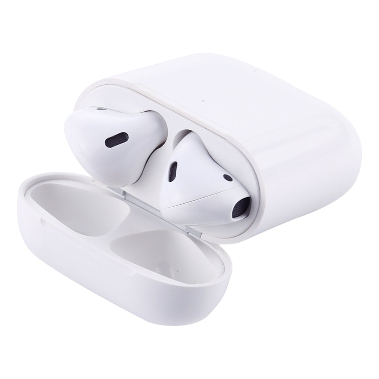 White AirPods-style dummy headphones with open charging case, earbuds resting inside