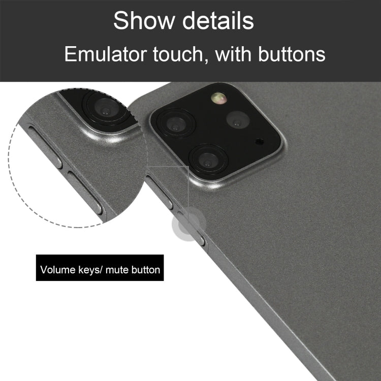Tablet dummy display model detail: rear camera area and side volume/mute buttons