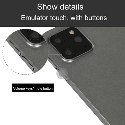Tablet dummy display model detail: rear camera area and side volume/mute buttons