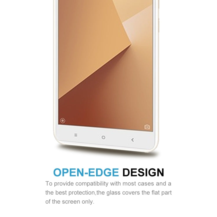 Tempered glass screen protector with open-edge design covering the flat display area