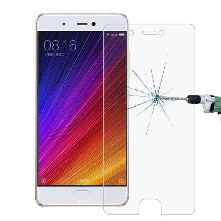 Tempered glass screen protector sheet with shatter-resistant crack pattern visible