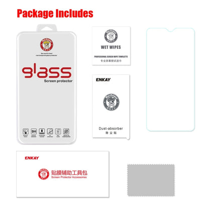 Screen protector package includes wet wipes and dust absorber accessory, plus glass film