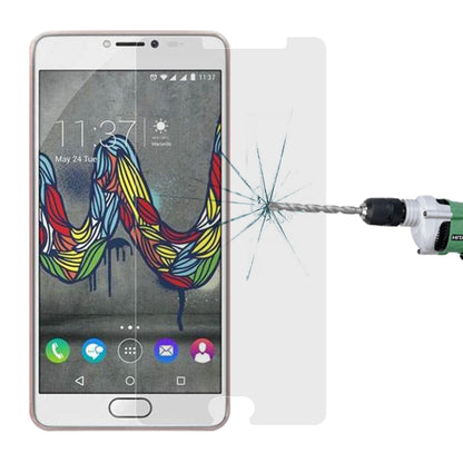 Tempered glass screen protector on smartphone with visible impact-crack pattern