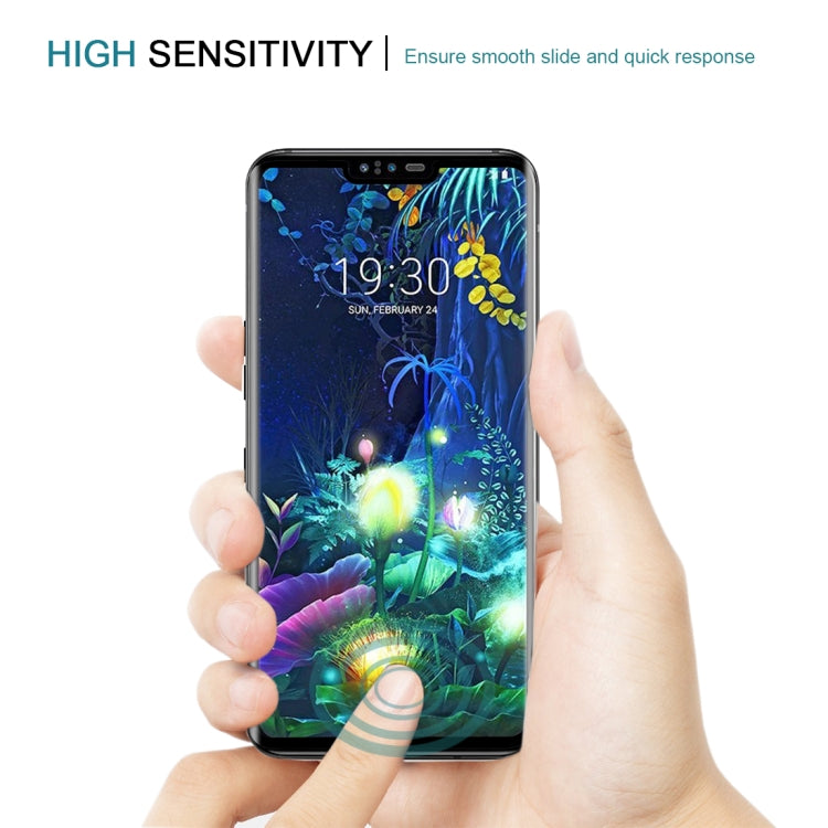 Tempered glass screen protector film for LG V50 ThinQ 5G being applied