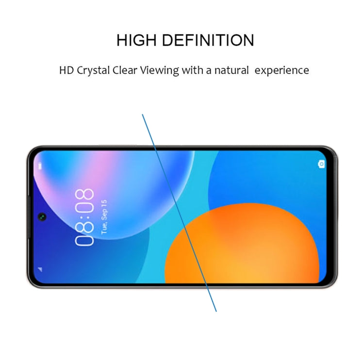 Tempered glass screen protector aligned across smartphone display