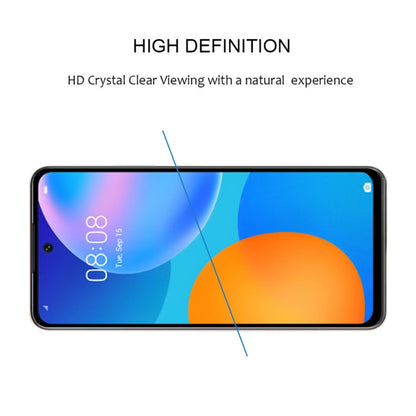 Tempered glass screen protector aligned across smartphone display