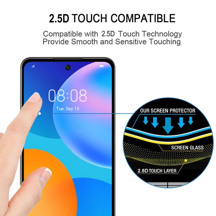 Tempered glass screen protector being applied to smartphone front