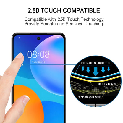 Tempered glass screen protector being applied to smartphone front