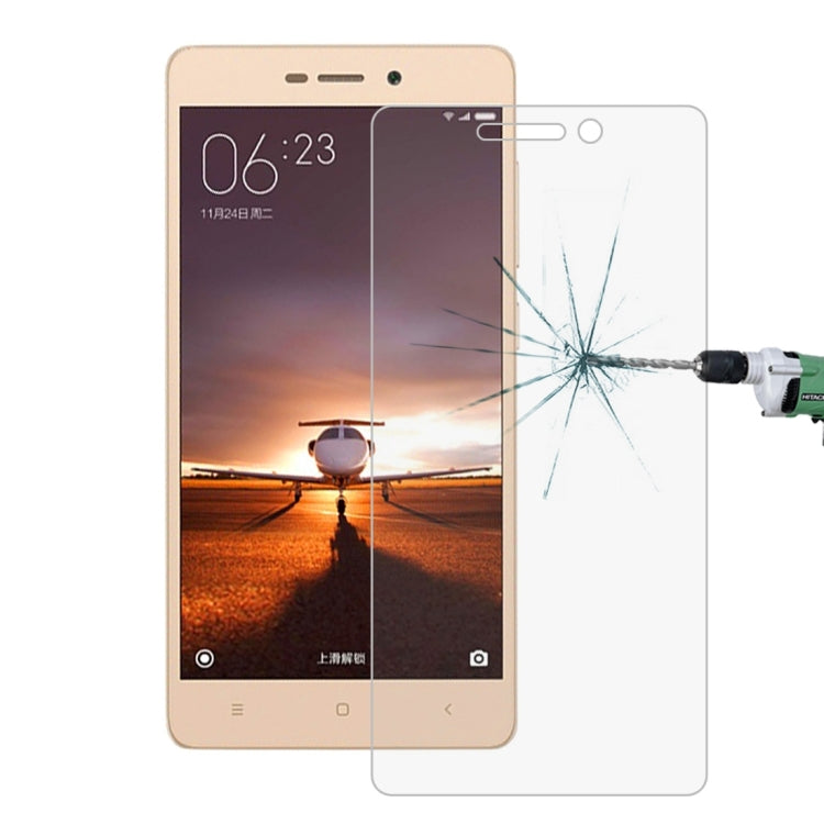 Tempered glass screen protector covering phone display, with impact crack shown