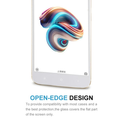 Tempered glass screen protector covering the flat part of a smartphone display