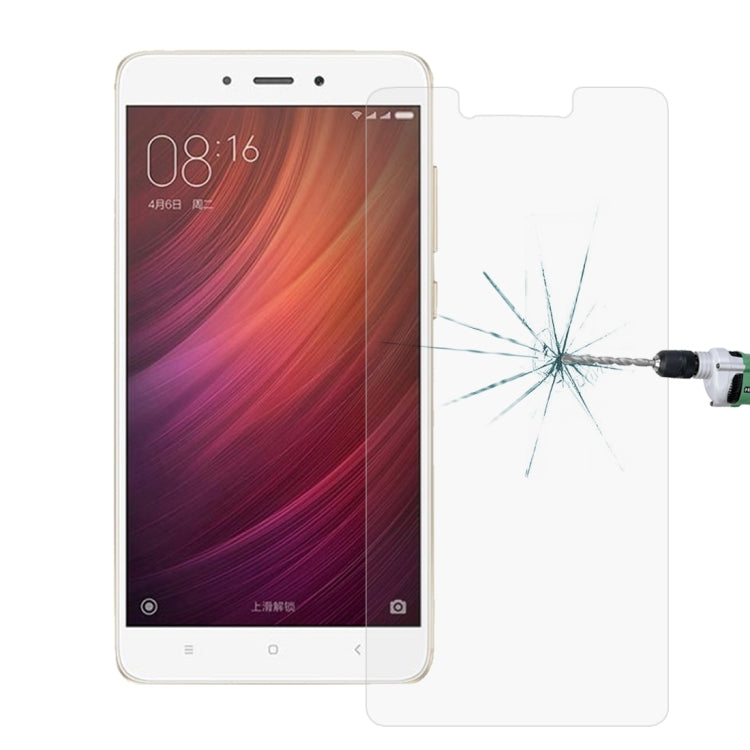 Tempered glass screen protector sheet showing spiderweb crack pattern