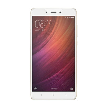 Tempered glass screen protector on smartphone screen, clear full coverage