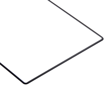 Rounded-edge tempered glass screen protector corner with thin black border
