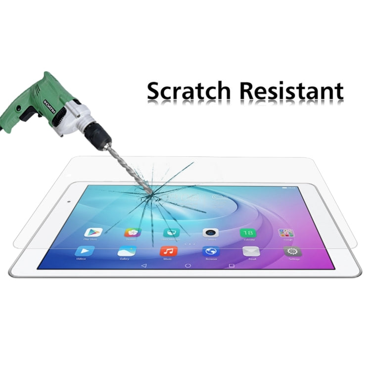 Clear tempered glass screen protector on tablet, drill impacts with cracked screen