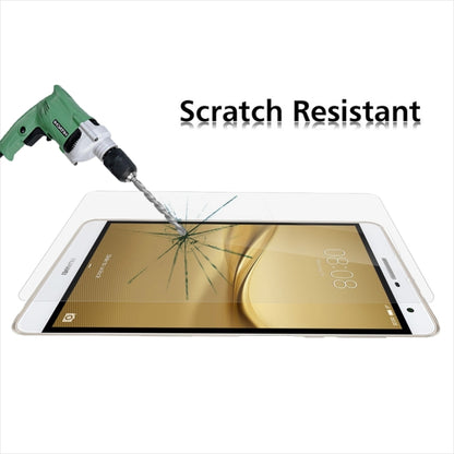 Tempered glass screen protector with impact test on tablet screen surface