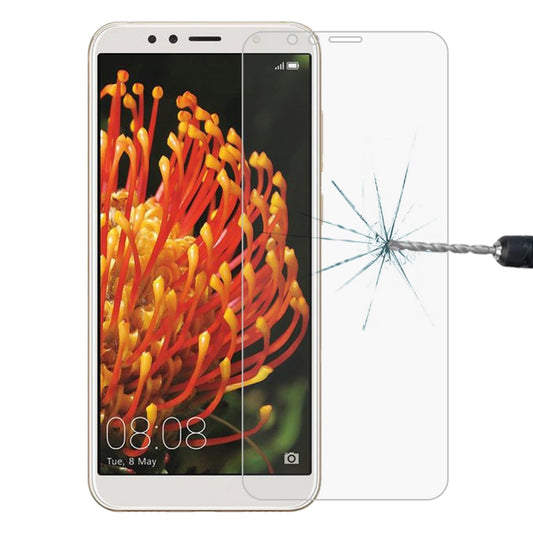 Tempered glass screen protector with cutouts, applied to a smartphone screen