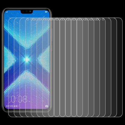 Set of 100 curved tempered glass screen protectors stacked for smartphone screens