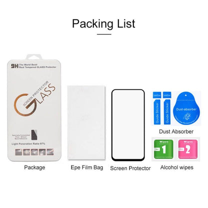 Screen protector kit with tempered glass film, wipes, and dust-absorber items