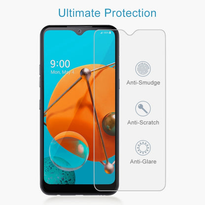 Tempered glass screen protector covering phone screen with anti-smudge and scratch resistance