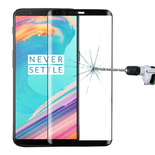 Tempered glass screen protector for OnePlus 5T, crack-resistant panel over phone display.