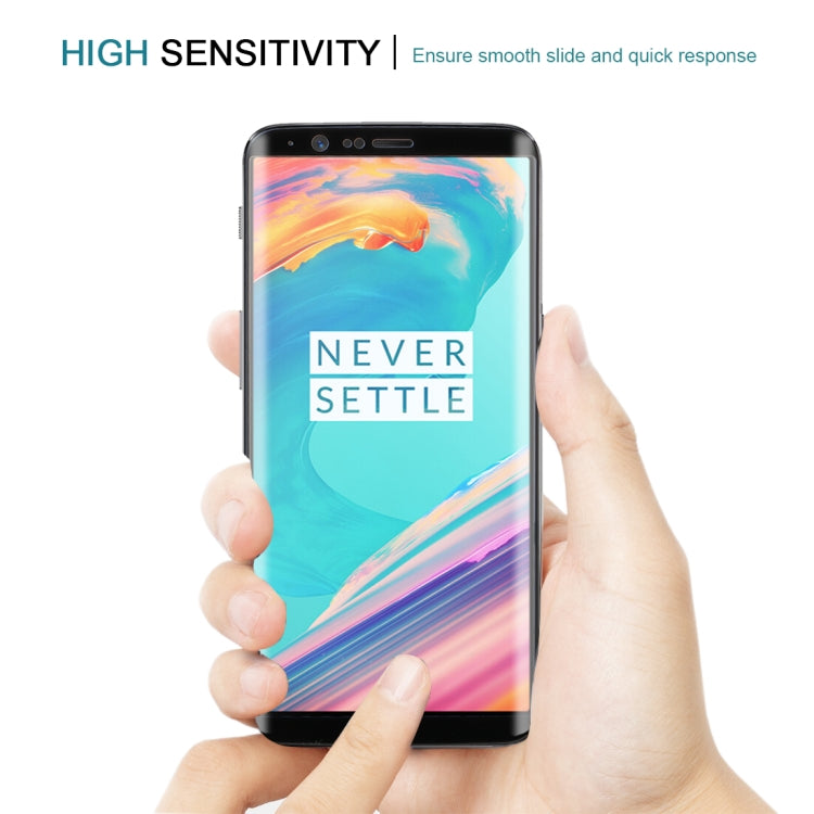 Tempered glass screen protector installed on phone screen for smooth, quick touch.