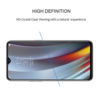 Tempered glass screen protector covering a smartphone front display, clear and smooth