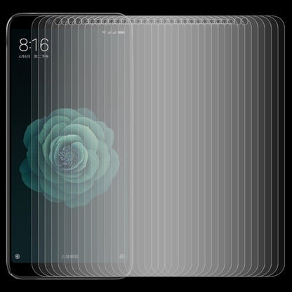 Stack of 50 clear curved tempered glass screen protector films for smartphone display