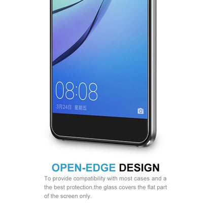 Tempered glass screen protector covering phone display, showing bottom edge fit