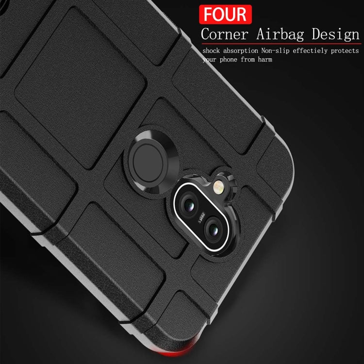 Black rugged silicone phone case for Nokia 8.1 / X7 showing four-corner airbag design