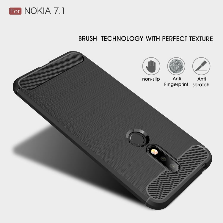 Brushed carbon fiber TPU phone case, dark color, angled with textured corner grip panels