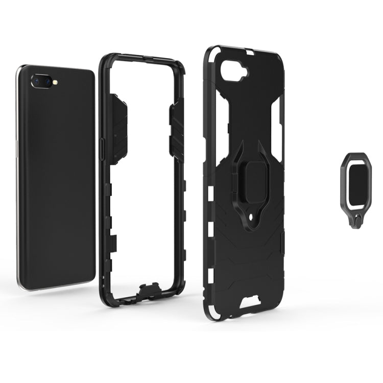 Black phone case with open cutouts; includes magnetic ring holder