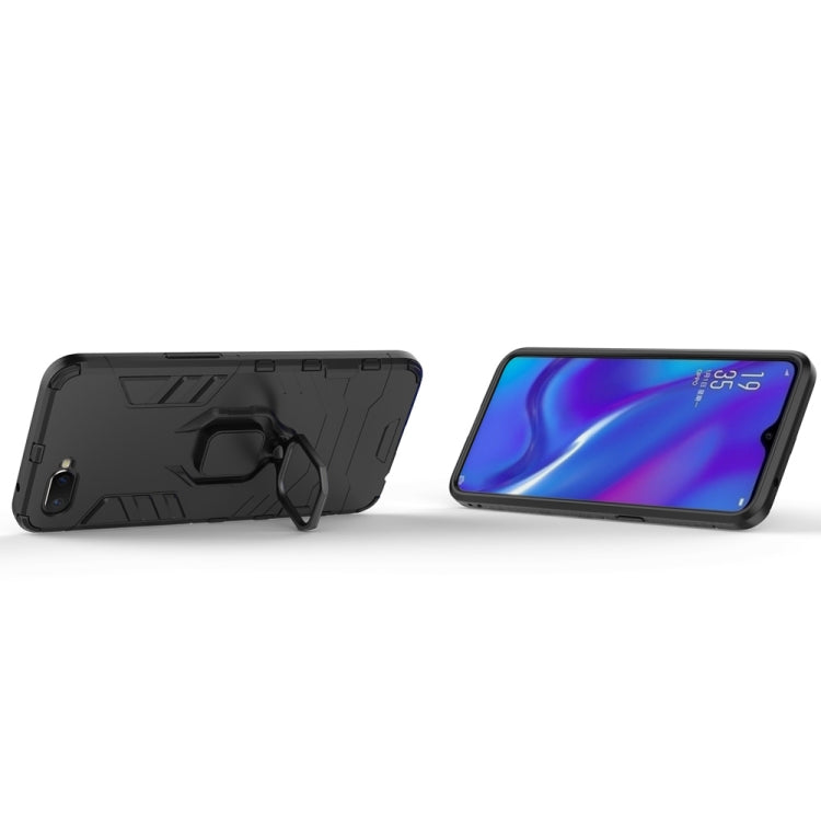 Black rugged phone case with stand ring holder; side view