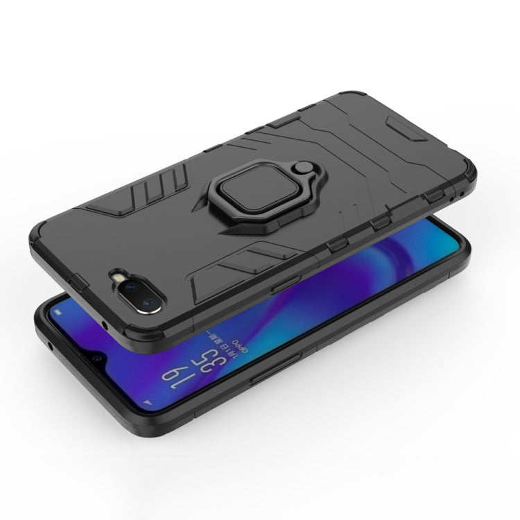 Black shockproof case with magnetic ring holder; phone shown from side