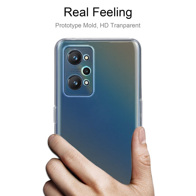Transparent TPU phone case with camera cutouts, held in hand for Realme GT Neo2