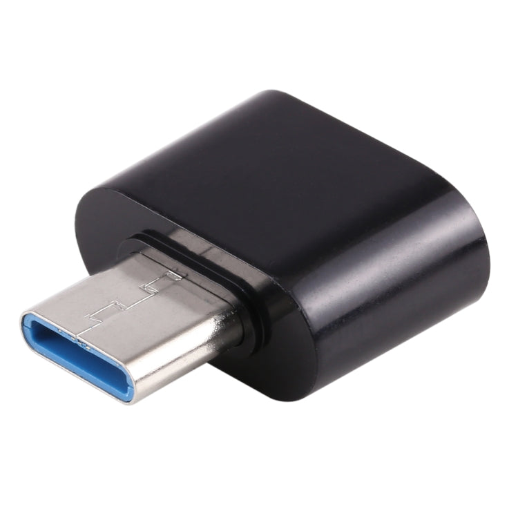 Black USB-C male to USB 2.0 OTG adapter, side view with USB port