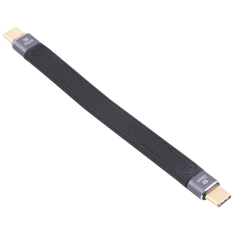 Soft flat USB-C cable with two Type-C connectors, dark fabric and gold ends