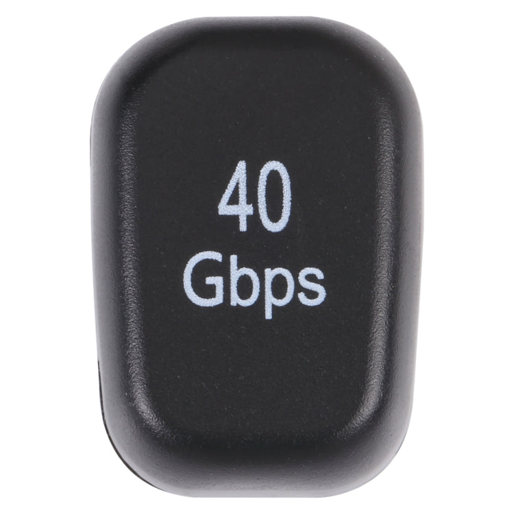Black USB-C adapter with “40 Gbps” marking on the front