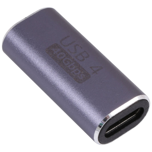 Alloy USB-C 4.0 female-to-female adapter, dark purple body with USB-C ports