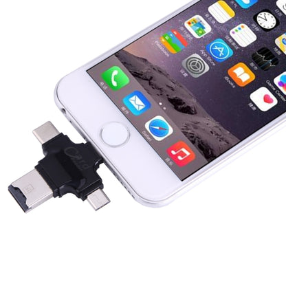 Black 4-in-1 card reader adapter connected to a smartphone