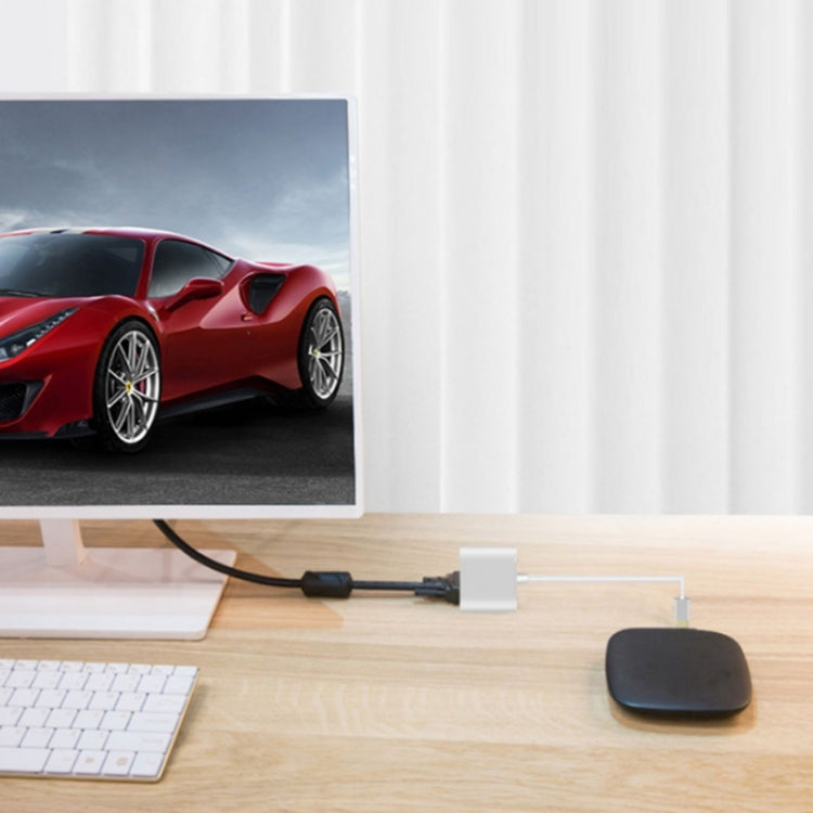 USB 3.0 to HDMI/VGA video converter connected to laptop