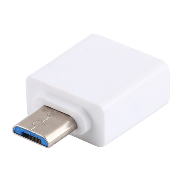White Micro USB OTG adapter showing metal plug and USB port