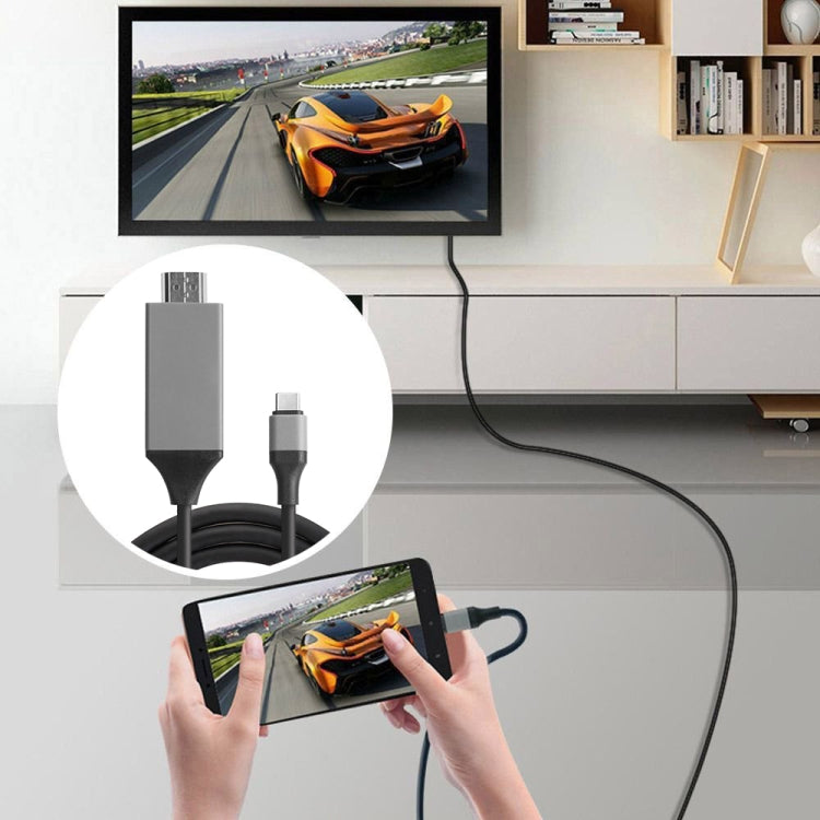 USB-C to HDMI adapter cable connected to a tablet for screen display