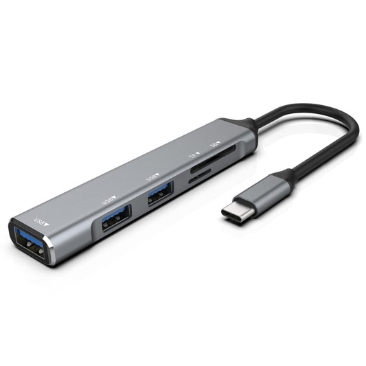 USB-C 5-in-1 adapter with three USB-A ports and SD/microSD slots, gray and black