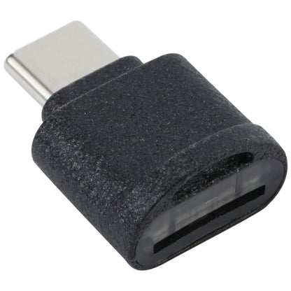 USB-C to TF card reader adapter with black textured housing and USB-C plug