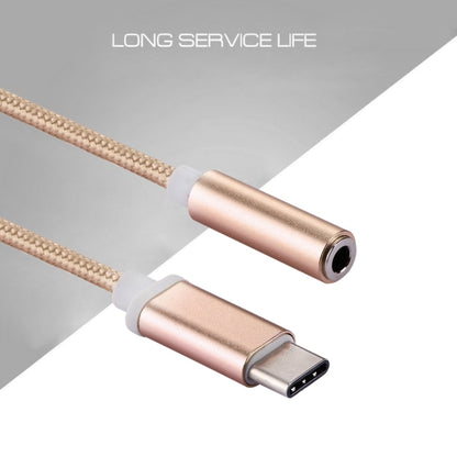 Rose gold USB-C to 3.5mm audio adapter with braided cord and 3.5mm jack