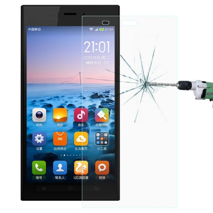 Tempered glass screen protector on phone screen with cracked impact area