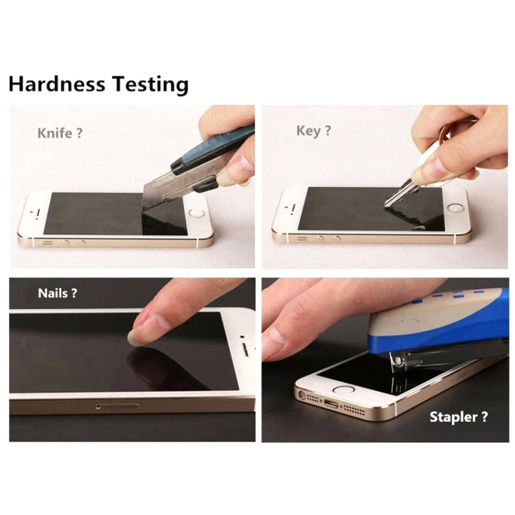 Tempered glass screen protector during hardness test with knife, key, nails, stapler