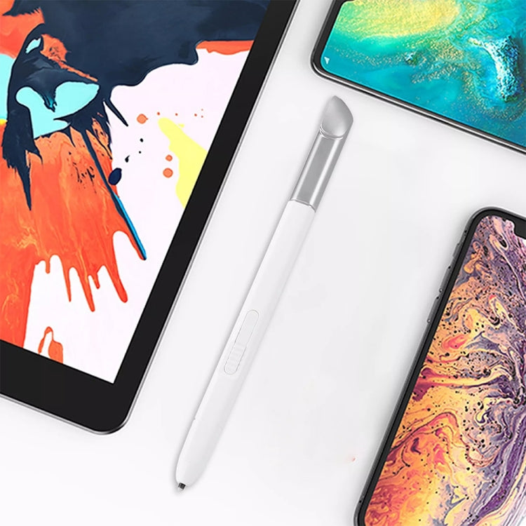 Close-up of white S Pen stylus lying on a tablet
